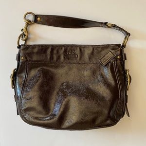 Coach handbag, in color dark brown.